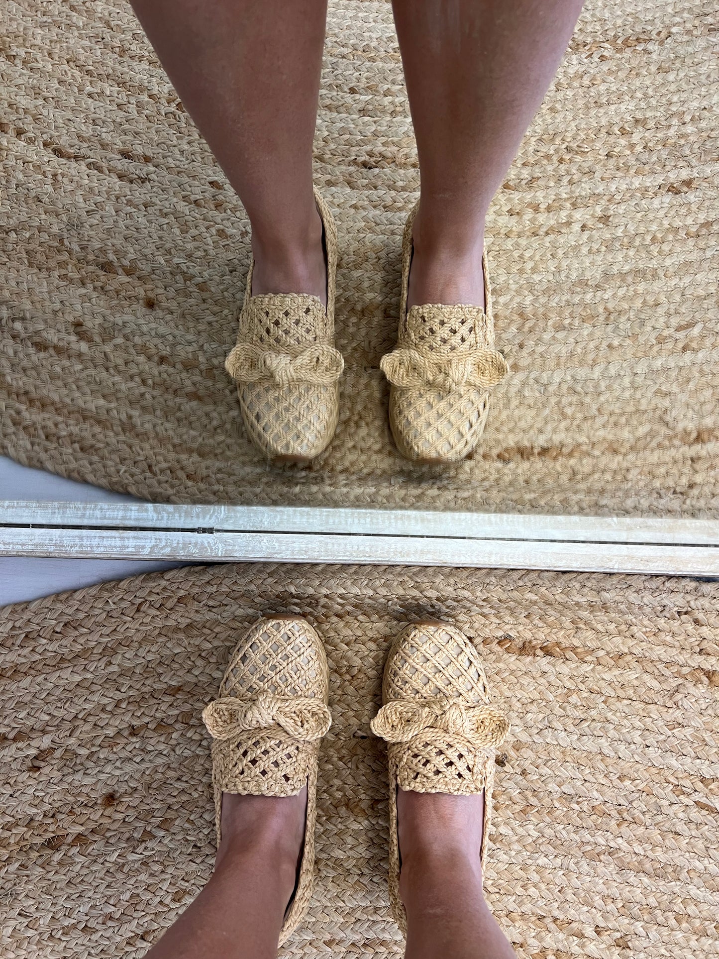Raffia slip ons.