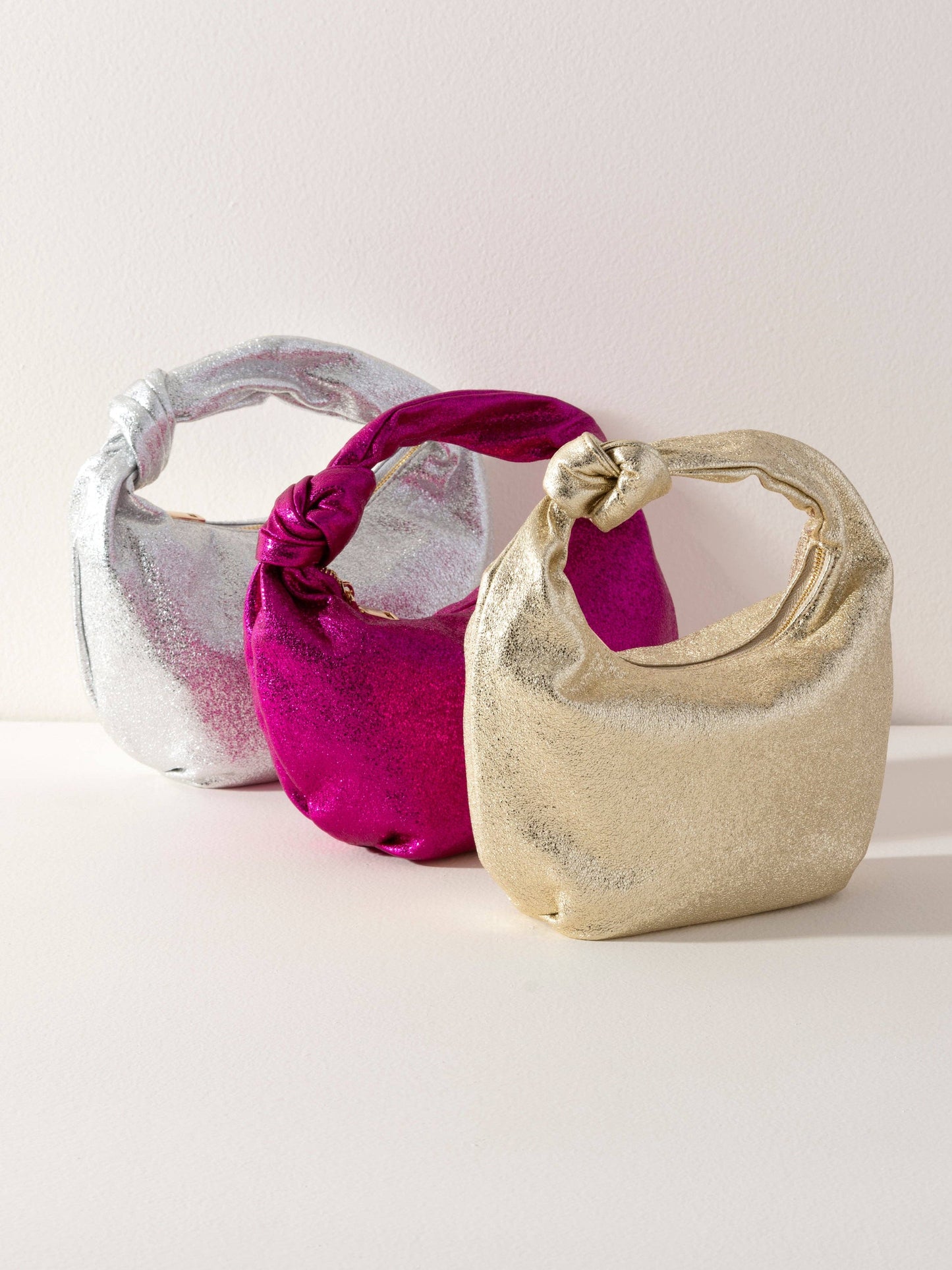 CHRISSY KNOTTED METALLIC TOP HANDLE BAG