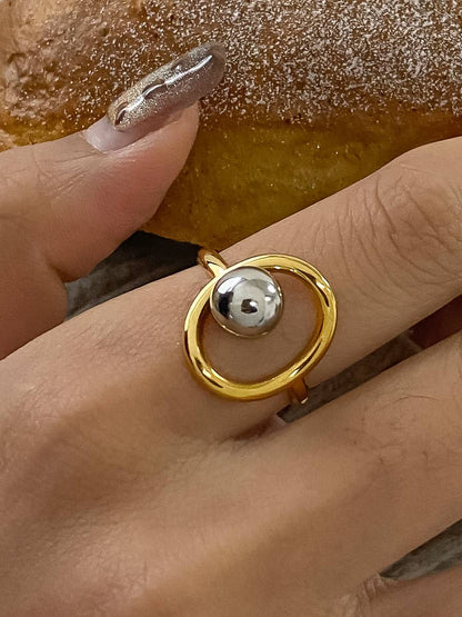 gold ring with silver ball