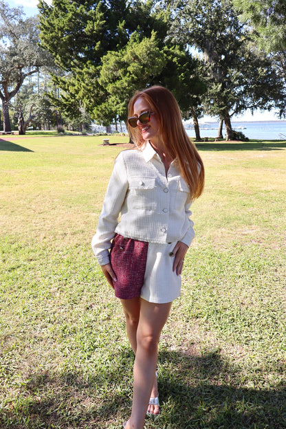 cream tweed jacket with cream and maroon tweed shorts