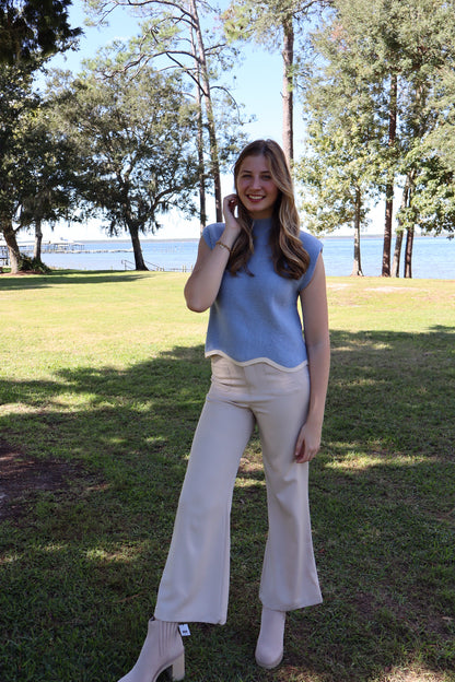 blue sweater with khaki pants