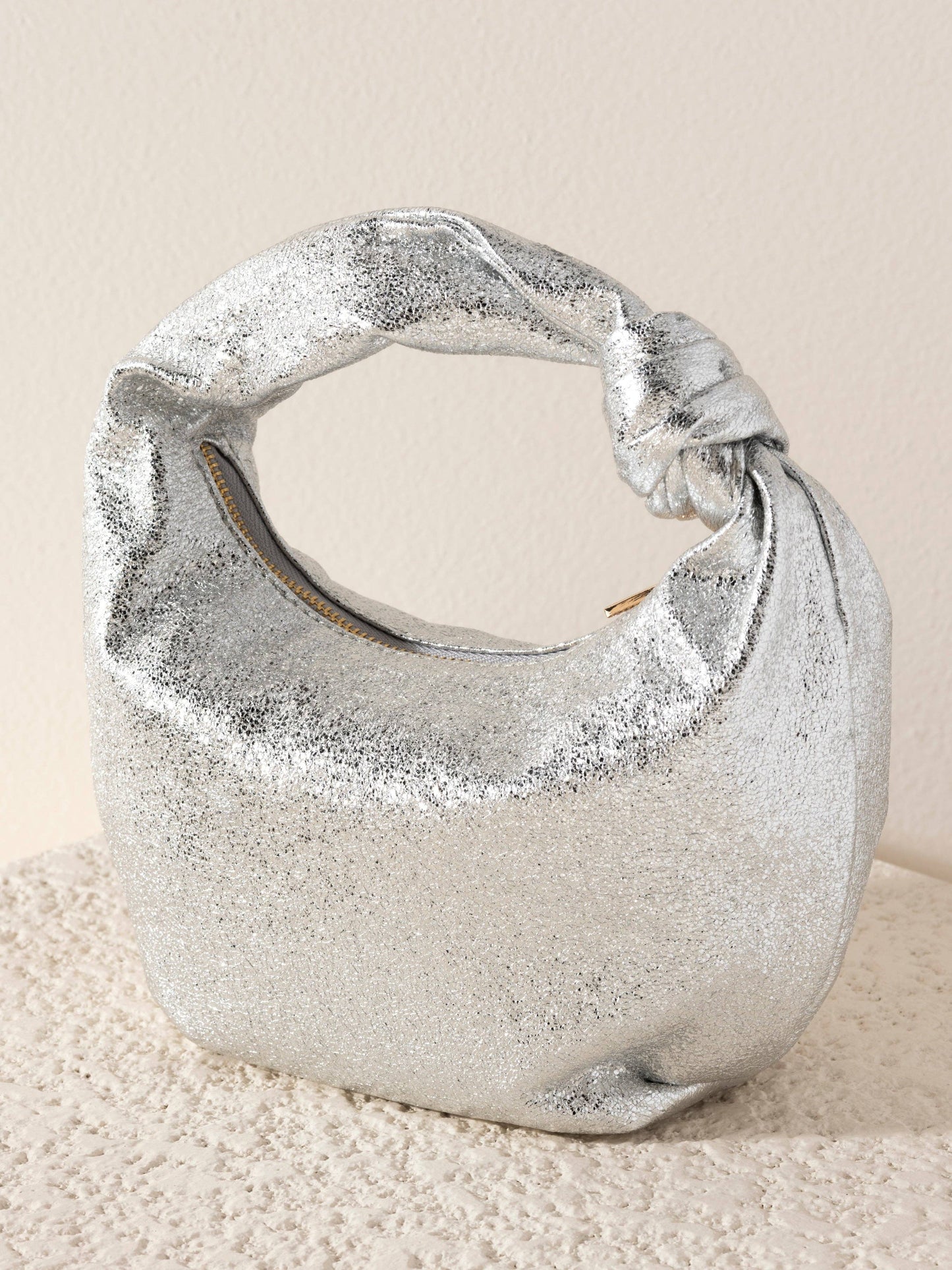 CHRISSY KNOTTED METALLIC TOP HANDLE BAG